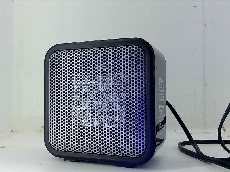 Compact Amazon Basics Mini Portable Electric Heater Black 6x6cm