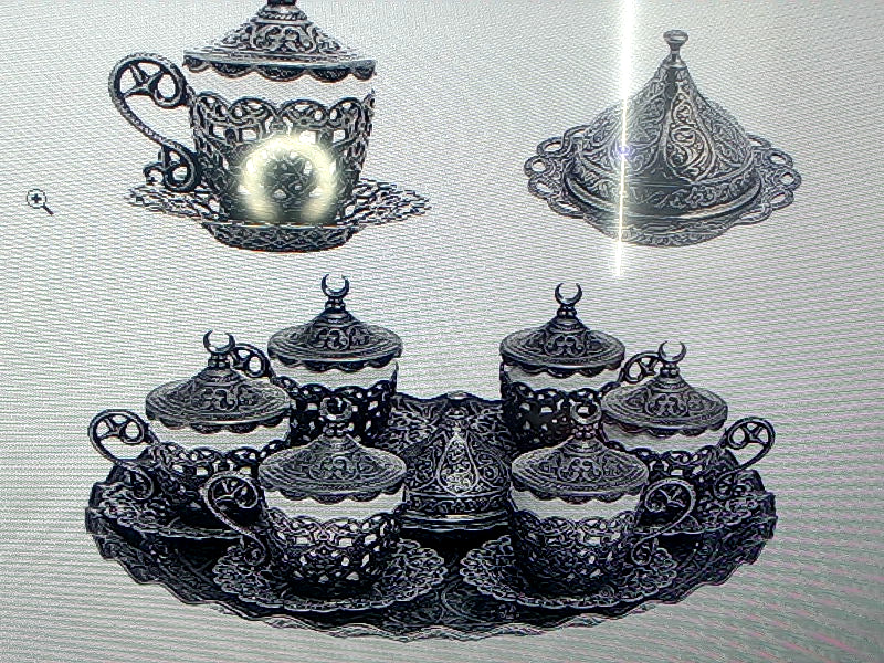 27-Piece Ornate Coffee Cup and Saucer Set